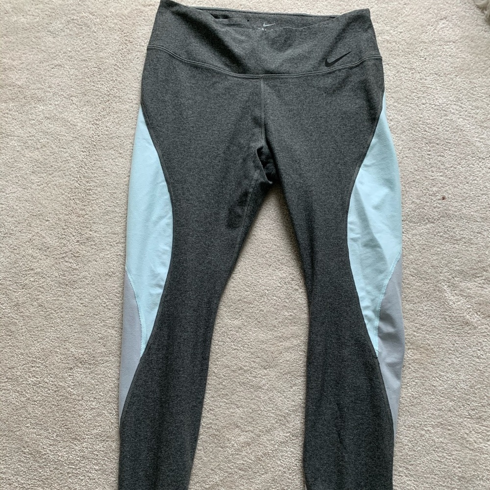 Gray and blue Nike leggings